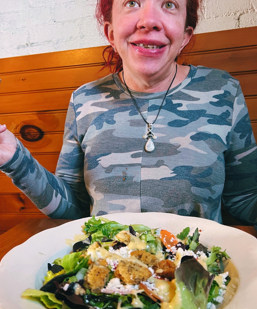 jo eating a salad with Bossman